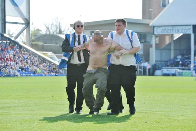 Pitch invaders at the Peterborough United v Sunderland match