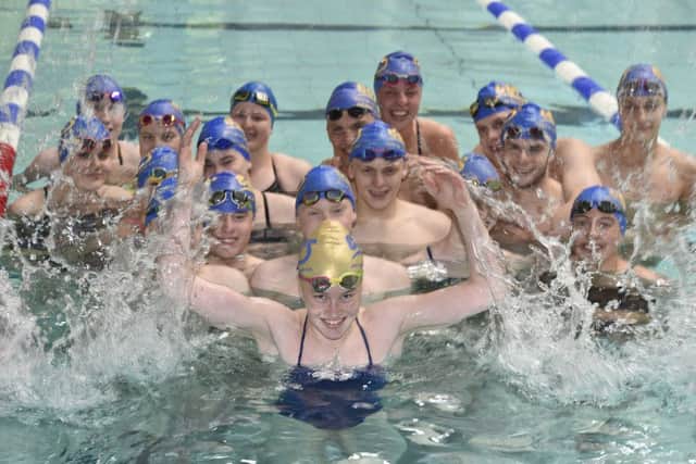 Olivia Lee training with COPS swimmers at the Regional Pool. EMN-190520-222925009