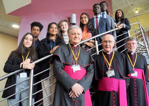 Pictured with sixth form students at St John Fisher is Papal Nuncio Archbishop Edward Adams (left), Bishop Alan Hopes and Mgr Vincent Brady (private secretary to the Nuncio).