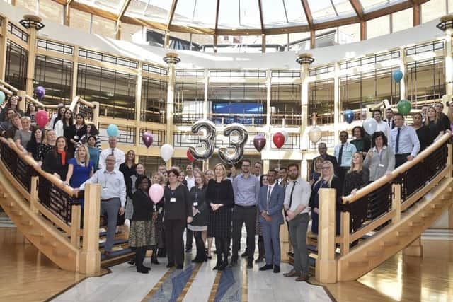 Coloplast staff celebrating their 100 Best Companies listing. EMN-190225-145111009