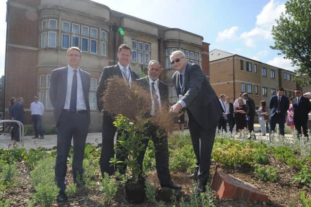 Official opening of the Accent new flats at 57 Lincoln Road. Paul Kitson from Homes England, Accent CEO Paul Dolan  , Mayor of Peterborough Coun. Gul Nawaz and Coun John Holdich planting a tree in the grounds. EMN-190524-144730009