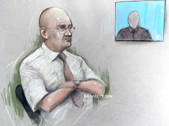 File photo dated 01/06/18 of a court artist sketch by Elizabeth Cook of Bob Higgins watching a witness interview in the dock at Salisbury Crown Court, as he has been found guilty at Bournemouth Crown Court of 45 charges of indecent assault against teenage boys. PRESS ASSOCIATION Photo. Issue date: Thursday May 23, 2019. See PA story COURTS Football. Photo credit should read: Elizabeth Cook/PA Wire EMN-190523-151424001