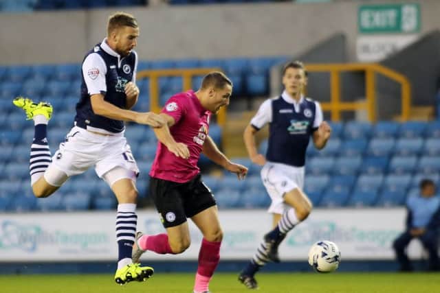 Mark Beevers (left) playing for Millwall against Posh in 2015.