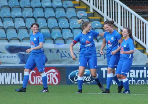 Posh Ladies celebrate scoing  one of eight goals. From the left are  Jenna Kiely, Keir Perkins, Stacey Mcconville (goalscorer) and Leah Crawford. Picture: Gary Reed
