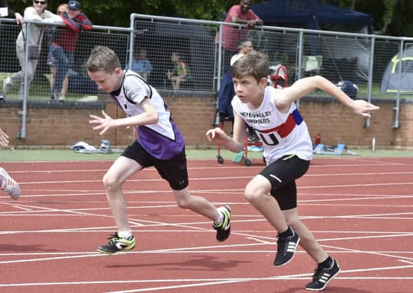 Fraser Boole gets away well for Nene Valley Harriers in the Under 13 100m.