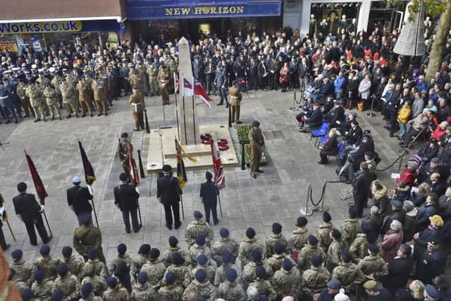 Remembrance Sunday 100th anniversary of Armistice wreath laying and parade in the city centre. EMN-181111-182313009