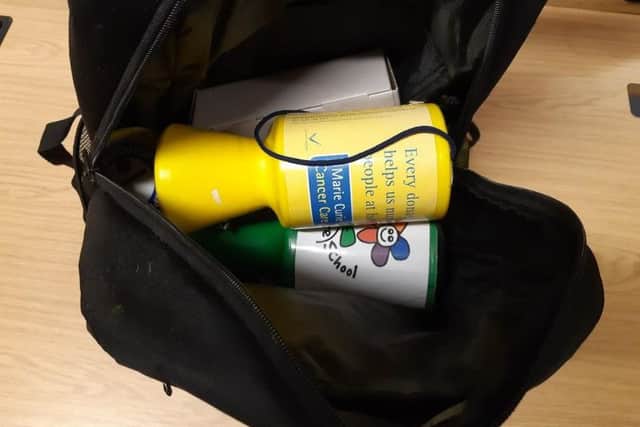 The stolen charity tins