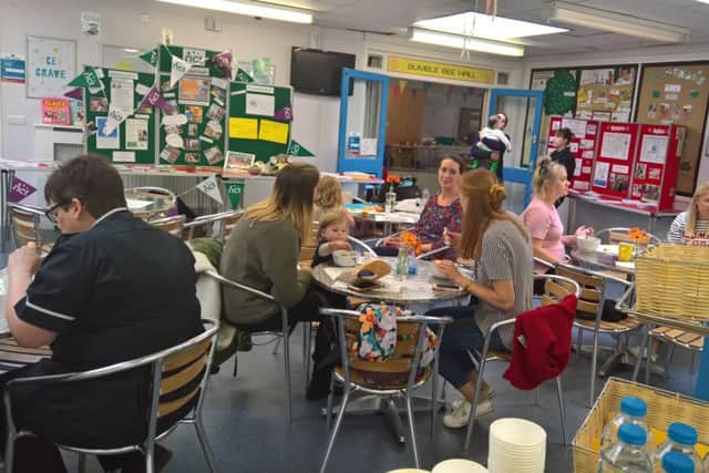 Families at the opening of the hub