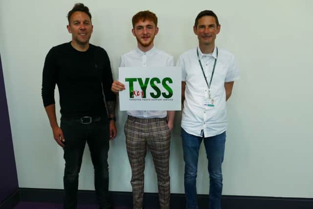 Rob Harradine, a graphic designer from Raw Creative who helped produce the logo, Adam Golding and Bruce Stancombe.