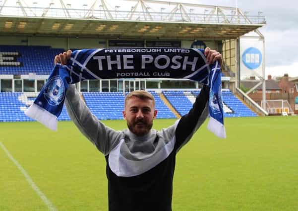 Dan Butler after signing for Posh.