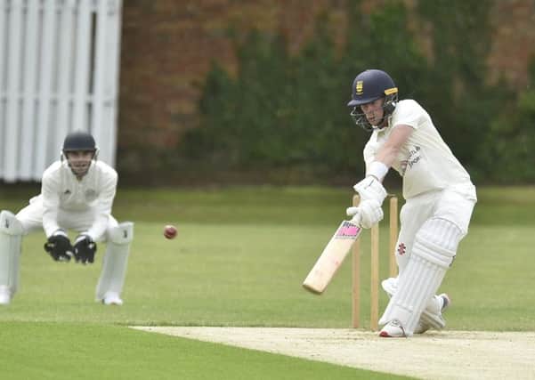 Jordan Temple on his way to 74 for Bourne against Market Deeping. Photo: David Lowndes.