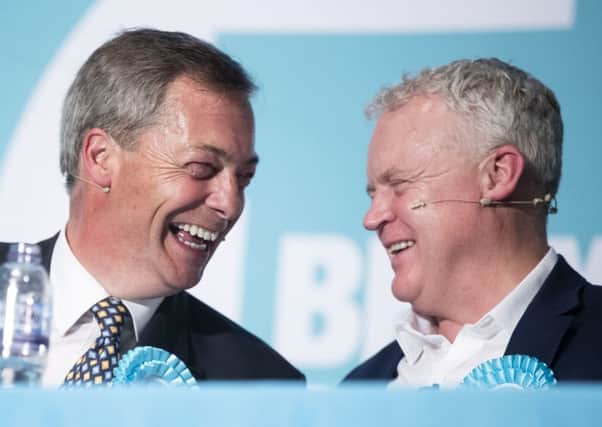 Brexit Party leader Nigel Farage (left) and Brexit Party parliamentary candidate Mike Greene (right) during a Brexit Party rally at the Broadway Theatre in Peterborough ahead of the upcoming by-election. Picture: Danny Lawson/PA Wire