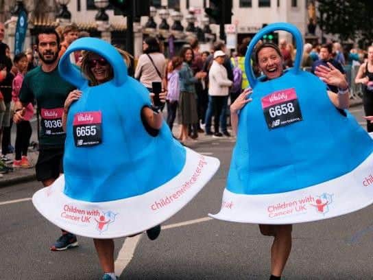 Liz and sister-in-law, Lisa completed the Vitality 10K dressed as the treatment bells