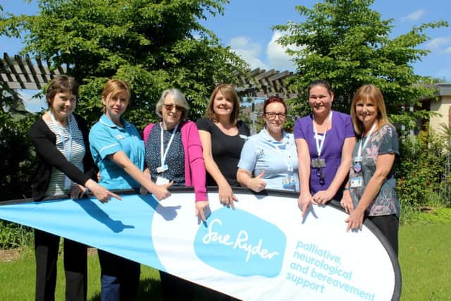 Members of the Sue Ryder dragon boat team