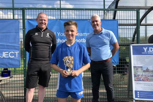 Player of the tournament Oskar Ciach with Marc Tracy (left) and Graham Fagan.