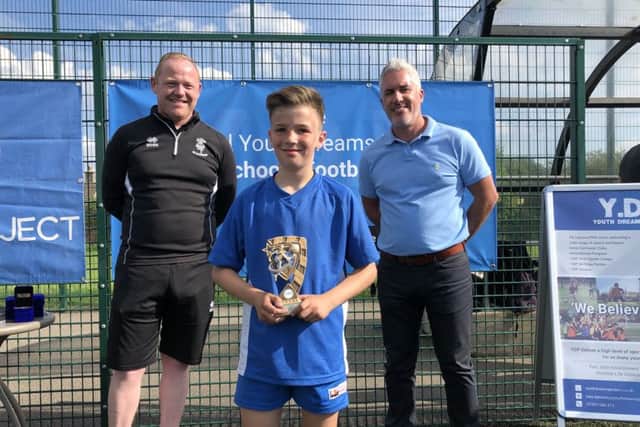 Player of the tournament Oskar  Ciach with Marc Tracy (left) and Graham Fagan.