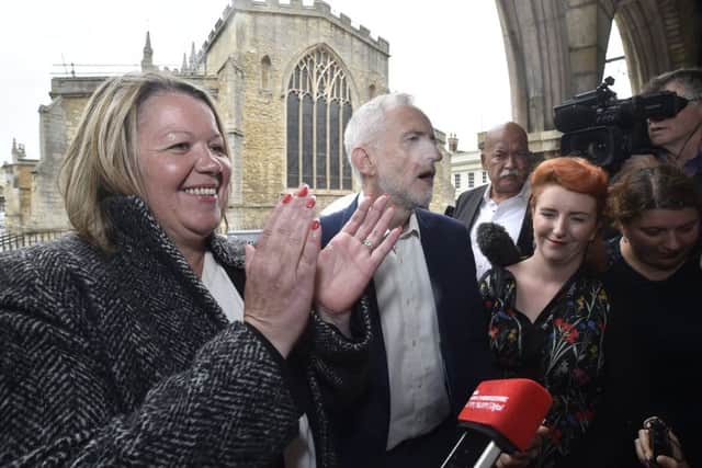 Lisa Forbes, Jeremy Corbyn and Louise Haigh in Peterborough city centre the morning after the election victory