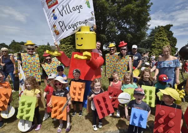 Werrington Carnival -   The Village playgroup with its giant Legoman EMN-180623-161934009