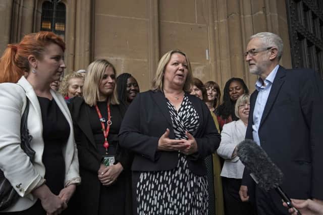 Labour Leader Jeremy Corbyn (right), the Shadow Cabinet and Labour MPs welcome newly-elected Labour Member of Parliament Lisa Forbes (centre) to Parliament in Westminster, London, following her victory in the Peterborough by-election. PRESS ASSOCIATION Photo. Picture date: Monday June 10, 2019. Photo credit should read: Victoria Jones/PA Wire POLITICS_Labour_15081274.JPG