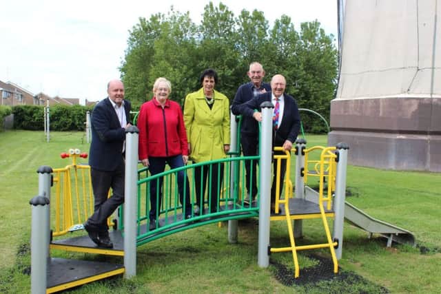 Simon Bell, Fenland District Councils leisure and open spaces contract manager; Cllr Kay Mayor, FDC chairman and town and district councillor for Whittlesey; Cllr Dee Laws, town and district councillor for Whittlesey; town councillor Cllr Ray Whitwell and Cllr Peter Murphy, FDCs portfolio holder for the environment, at the newy revamped play park