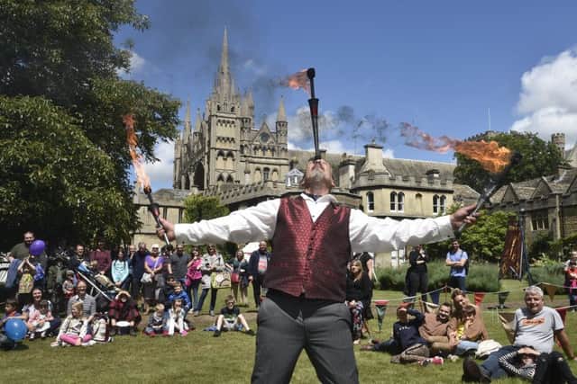 Peterborough Heritage Festival 2019. Firey Jack entertains the crowd. EMN-190616-214056009