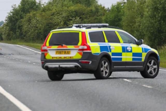 Police at the scene of the crash on the A16. Photo: Terry Harris