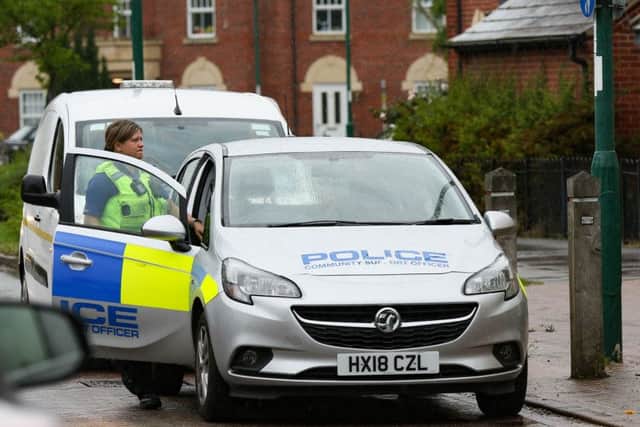 Police in West Lake Avenue. Photo: Terry Harris