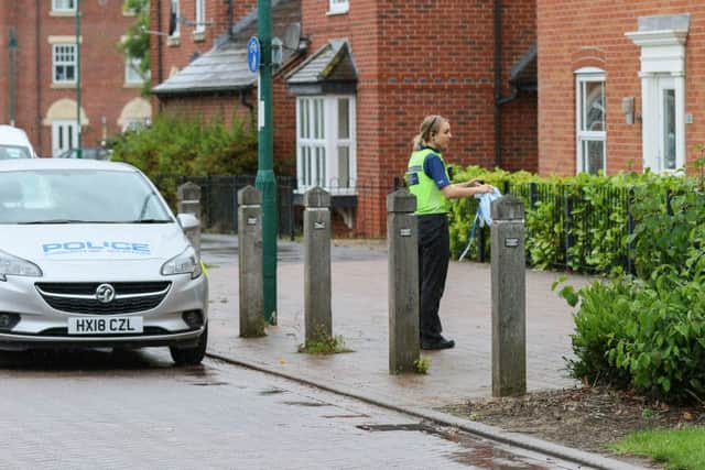 Police at the scene in West Lake Avenue, Hampton Vale. Photo: Terry Harris