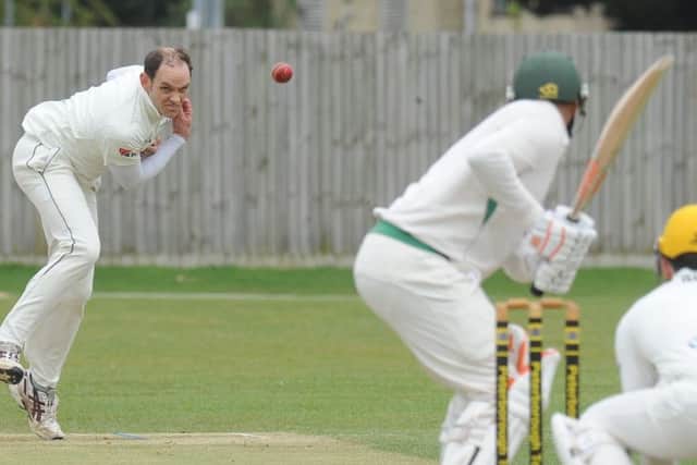 Richard Kendall took 3-9 for Peterborough Town against Ramsey.