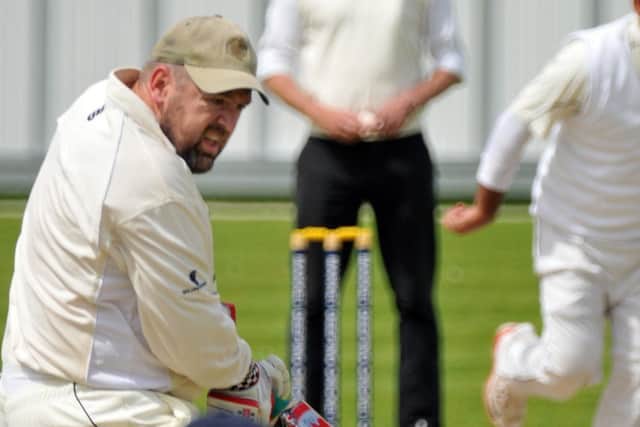John McDougall finished 100 not out for Hunts Over 50s against Norfolk.