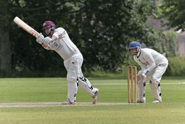 Ben Pyle hits out on his way to 74 for March against Wisbech. Photo: Pat Ringham.