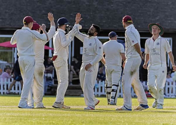 March players celeberate a Wisbech wicket. Photo: Pat Ringham.