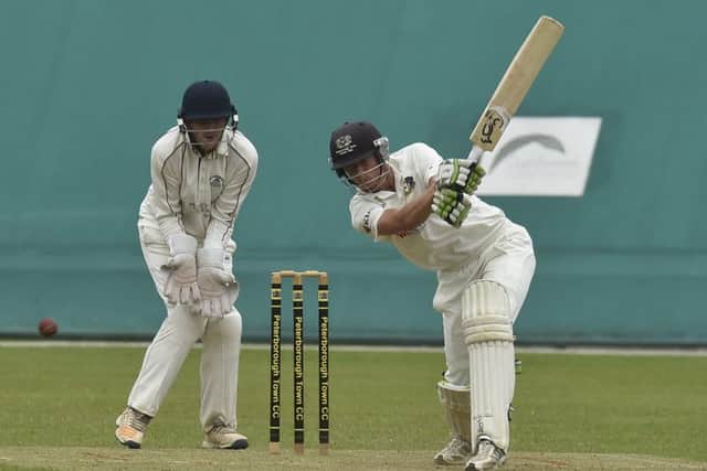 Scott Howard on his way to 60 for Peterborough Town against March Town. Photo: David Lowndes.