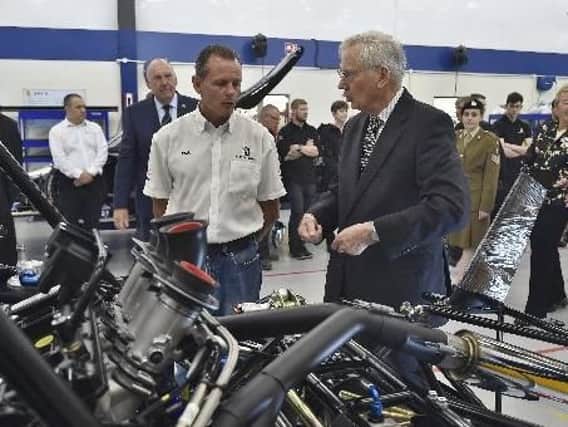 The Duke of Gloucester, right, talks to production manager Paul Widnall.