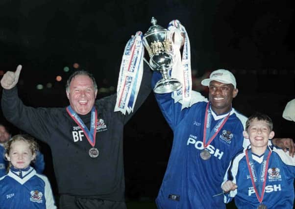 Manager Barry Fry (left) and Andy Clarke celebrate Posh winning promotion at Wembley in May, 2000.