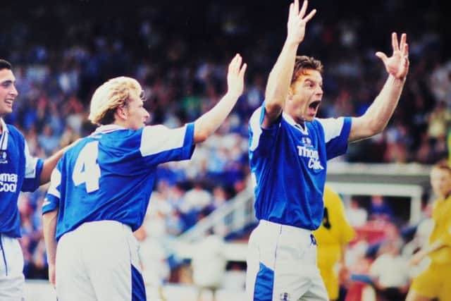 1996: One of the great London Road games full of spectacular goals and a stunning turnaround at the end by the visitors who had been 4-2 down. Sean Farrell (right) scored twice for Posh.