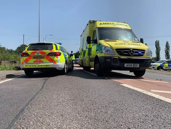 Police and the ambulance service at the collision at Fen Road. Photo: Cambridgeshire police