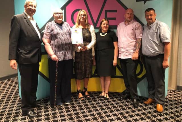 The Safer Off the Streets Partnership representatives with their award