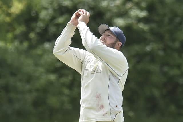 Alex Birch of Stamford Town takes a catch in a two-wicket  win over Werrington. Photo: David Lowndes.