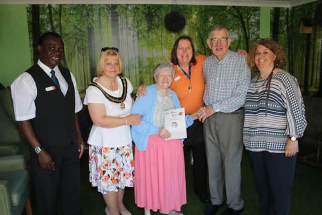 Cllr Julie Windle (second from left) at The Gables Care Home. Photos courtesy of RWT Photography