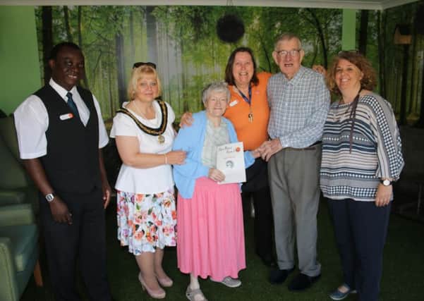 Cllr Julie Windle (second from left) at The Gables Care Home. Photos courtesy of RWT Photography
