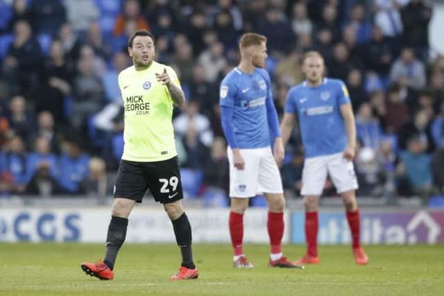 Lee Tomlin after scoring for Posh at Portsmouth last season.