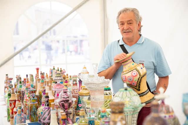 Mich Soccio shows off his impressive vases at the italian festival,City Centre, Peterborough07/07/2019. Picture by Terry Harris / Peterborough Telegraph. THA