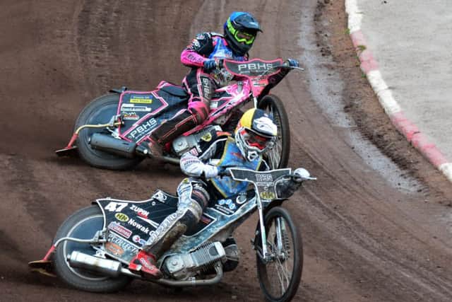 Erik Riss leads the way from Josh Bates.