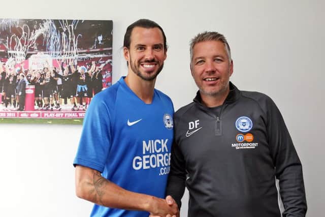George Boyd with Posh manager Darren Ferguson. Photo: Joe Dent/theposh.com.