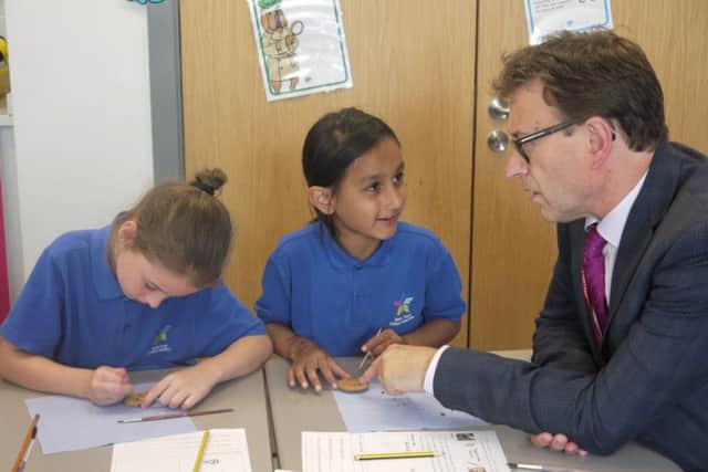 Ofsted Regional Director Paul Brooker with West Town pupils