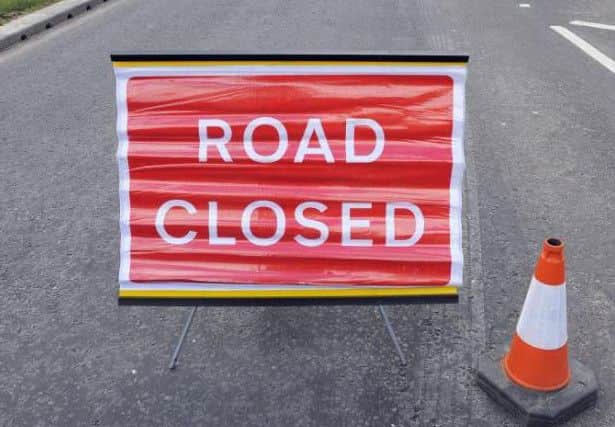 Road closed sign