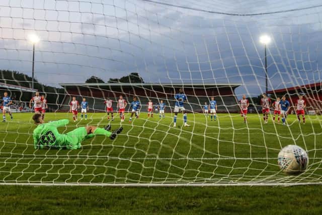 Mo Eisa scoring a penalty. Photo: Joe Dent