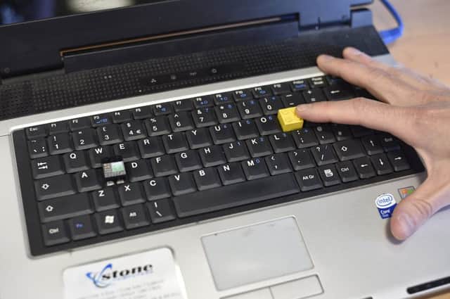 Lego pieces being used for laptop keys at Sacred Heart RC Primary School