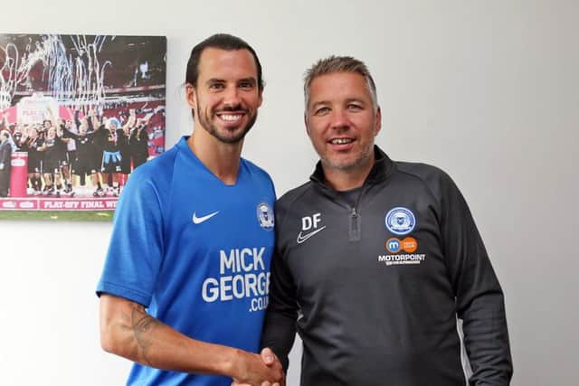 George Boyd (left) with Posh manager Darren Ferguson. Photo: Joe Dent/theposh.com